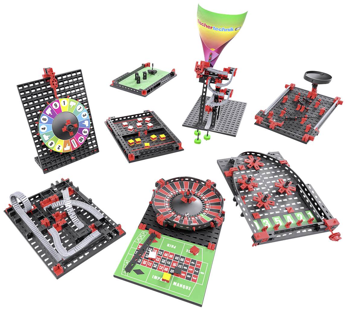 Experimentier-Set mit verschiedenen mechanischen Konstruktionen und Geräten wie Zahnrädern, einem Glücksrad und einer Kugelbahn.