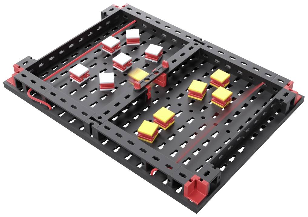 Ein rechteckiges Steckbrett mit roten und weißen Steckkomponenten auf schwarzem Untergrund. Es ist in zwei Bereiche unterteilt.