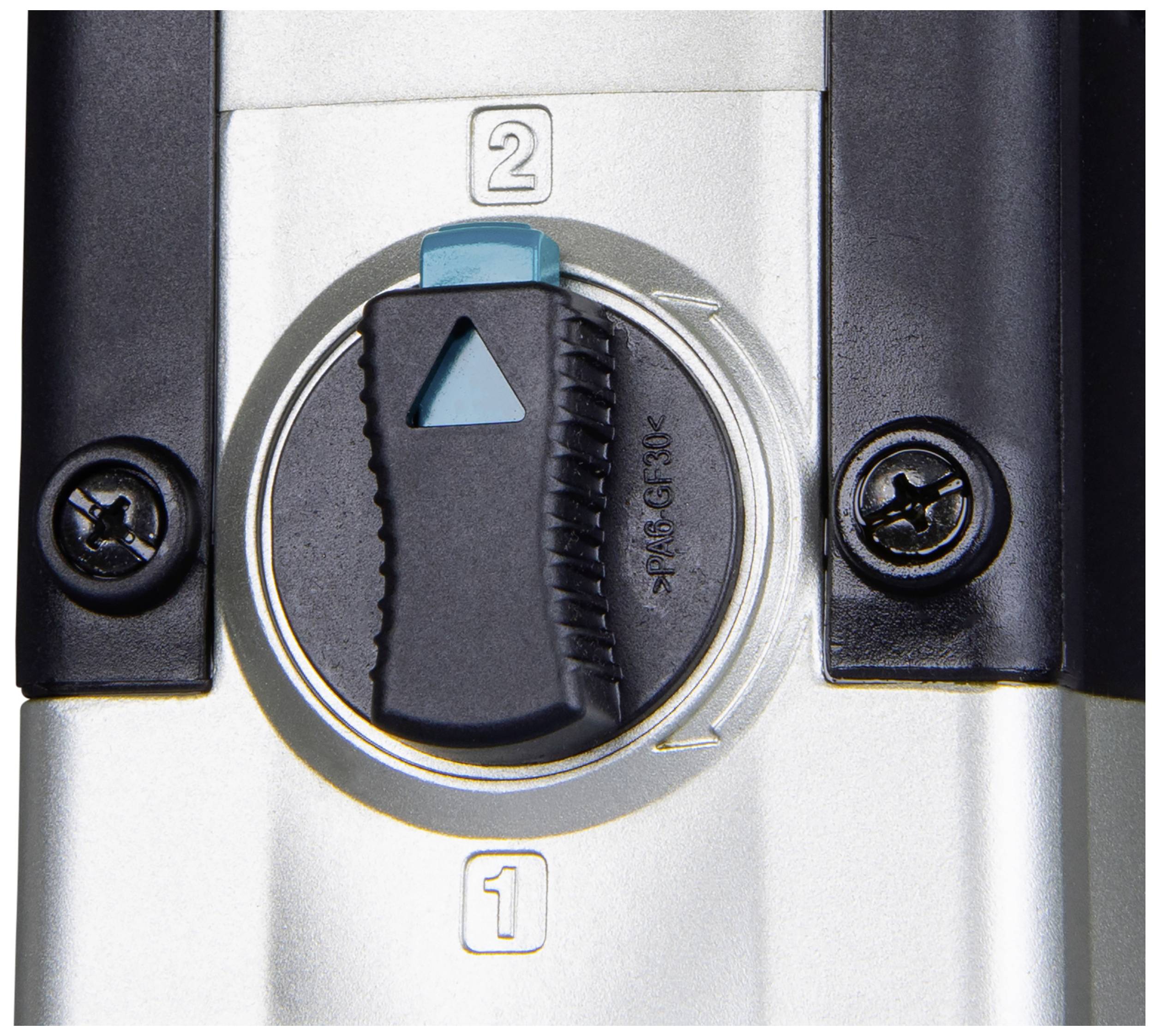 Ein Rundschalter mit zwei Positionen, '1' und '2', auf einem Metallgehäuse. Der blaue Pfeil zeigt auf die Position '2'.