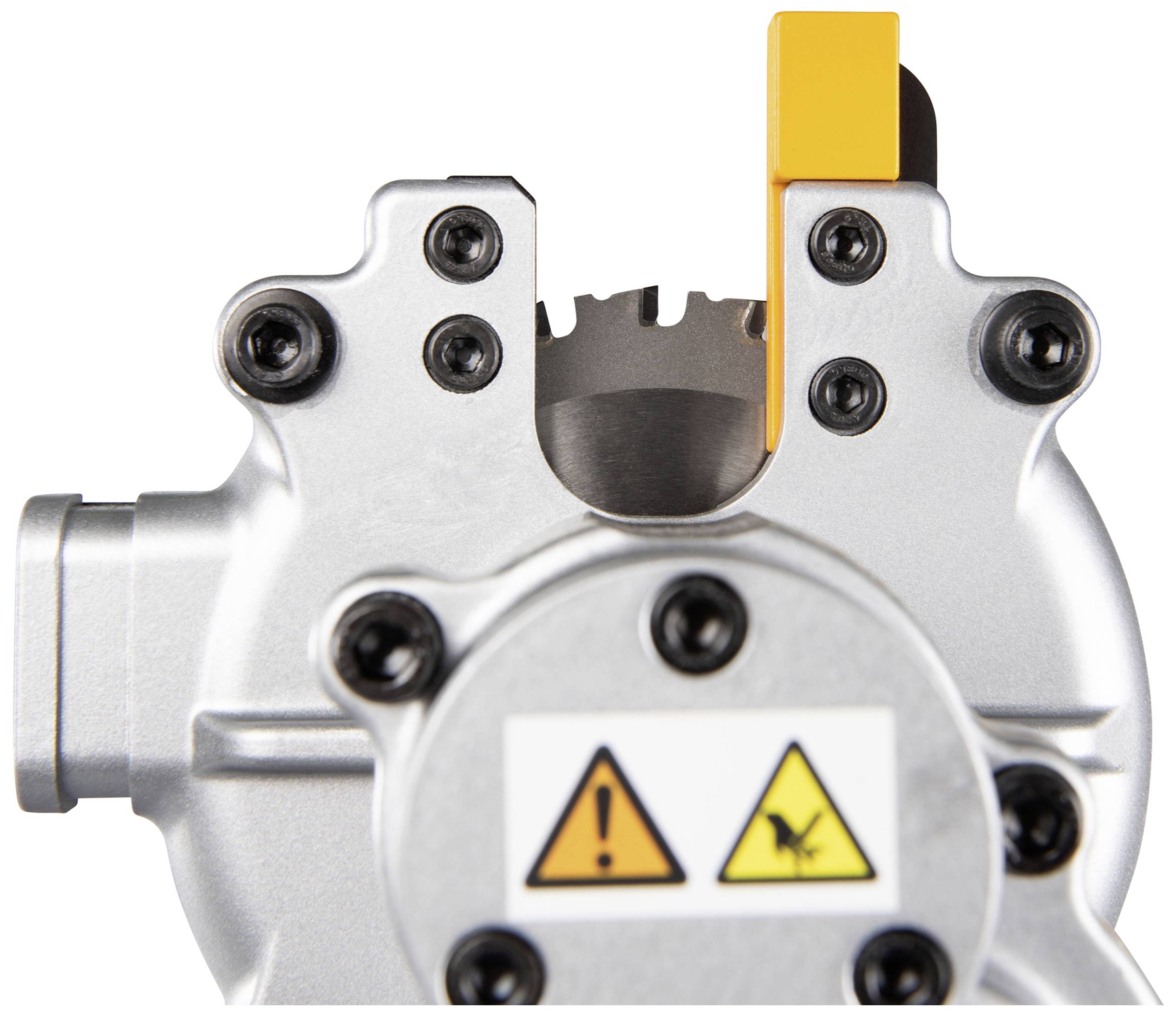 Maschinenteil mit Schneidklinge und Sicherheitswarnetikett.