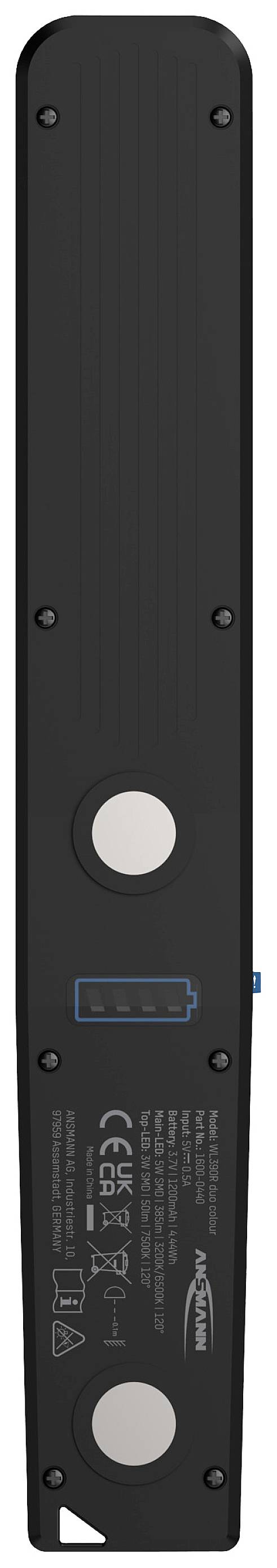 Schwarzes, rechteckiges Bauteil mit zwei runden Metallelementen und technischen Markierungen, das möglicherweise ein elektronisches Gerät ist.