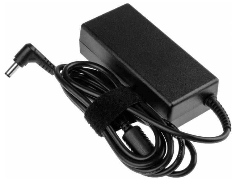 Ein schwarzes Laptop-Ladegerät mit Kabel, zusammengehalten durch einen Klettverschluss.