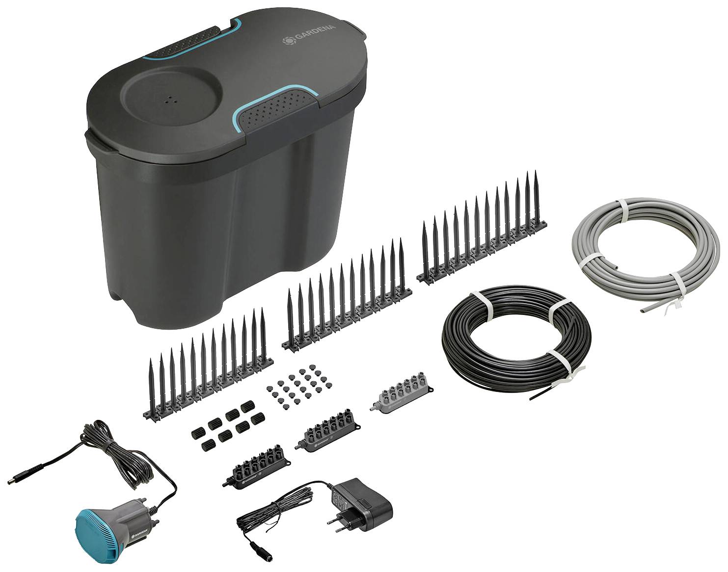 Gardena Bewässerungssystem: Integrierte Pumpe, Tropfbewässerungskomponenten, Kabel, Netzteil und Zubehör für Gartenpflanzen.