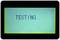 Display mit dem Text 'TESTING...', möglicherweise an einem elektronischen Gerät während einer Diagnosesequenz.
