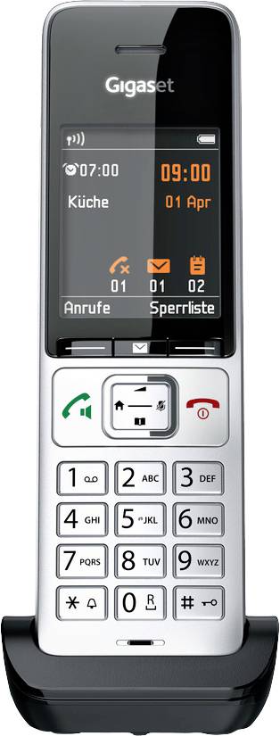 Schnurloses Telefon mit Display zeigt Zeit '09:00', Datum '01 Apr' und Symbolen für Telefonfunktionen.