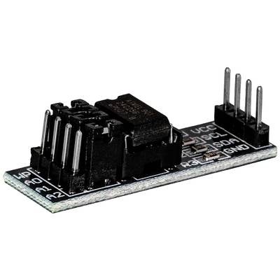 'Nahaufnahme einer elektronischen Platine mit mehrpoligem Bauelement und mehreren vertikalen Pins auf schwarzem PCB.'