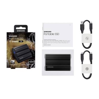 'Samsung Portable SSD T7 Shield' Verpackung mit 1TB Kapazität, begleitet von einem USB-Kabel und einer Bedienungsanleitung.