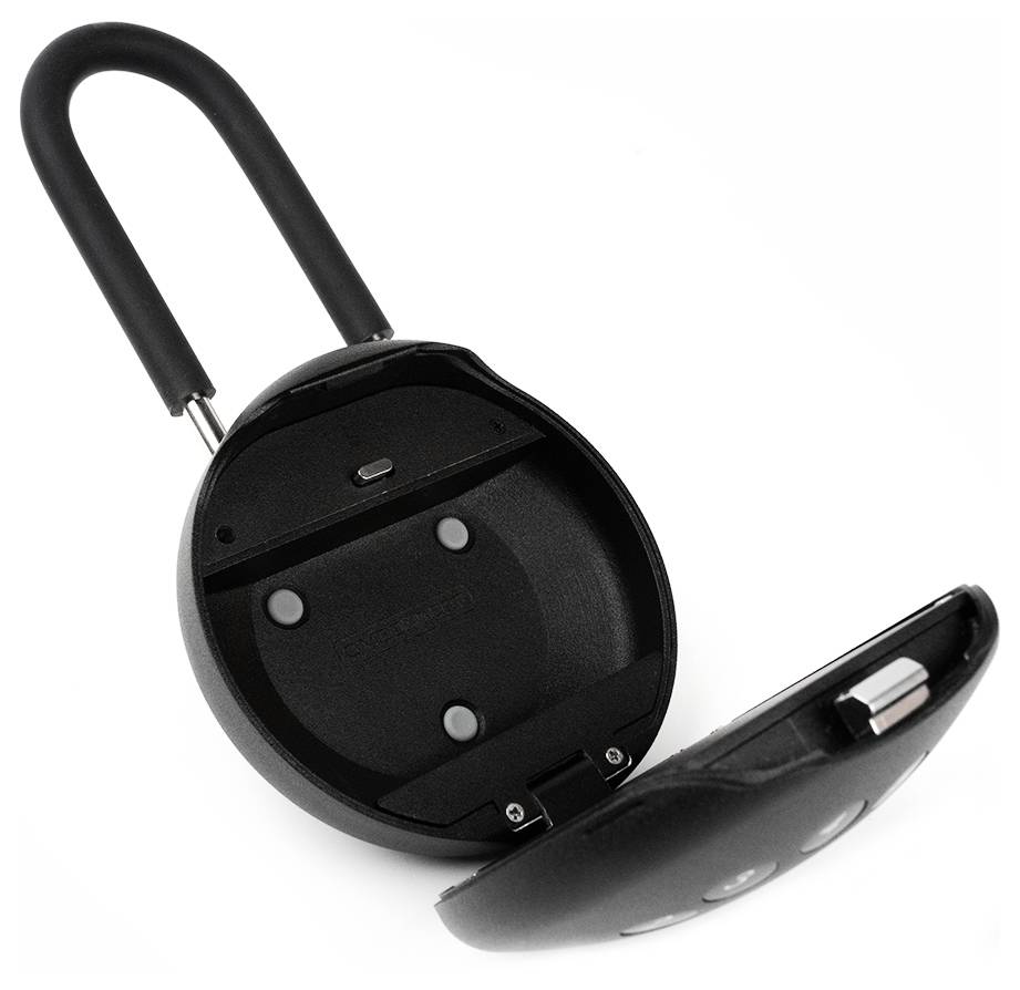 Schwarzes, rundes Schließfach mit offenem Deckel, zeigt Innenansicht mit Platz für kleine Gegenstände. Ideal für sichere Aufbewahrung.