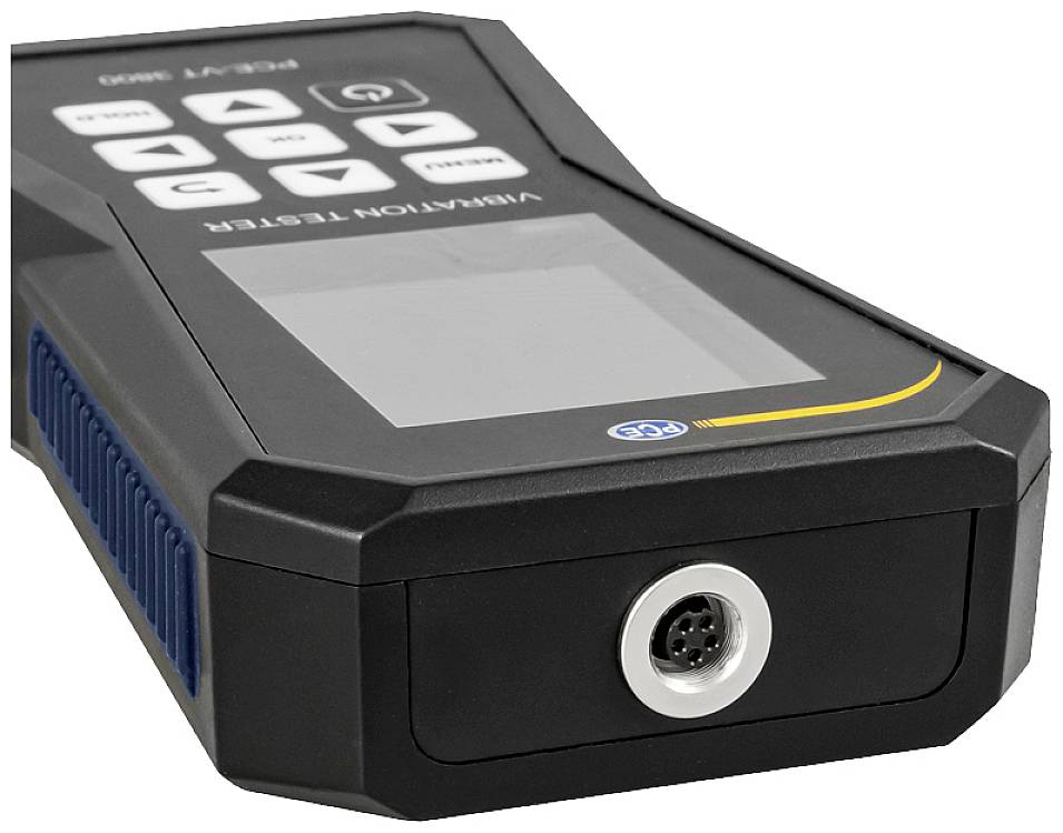 Ein tragbares Vibrationstestgerät mit Display und Bedientasten. Es hat einen Anschluss an der Unterseite für Kabelverbindungen.