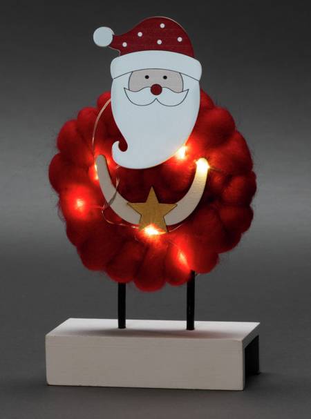 KONSTSMIDE 3267-550 LED Holzsilhouette \"Santa mit Baumwolle\", rot, 6H Timer, 6 warm weiße Dioden, ba