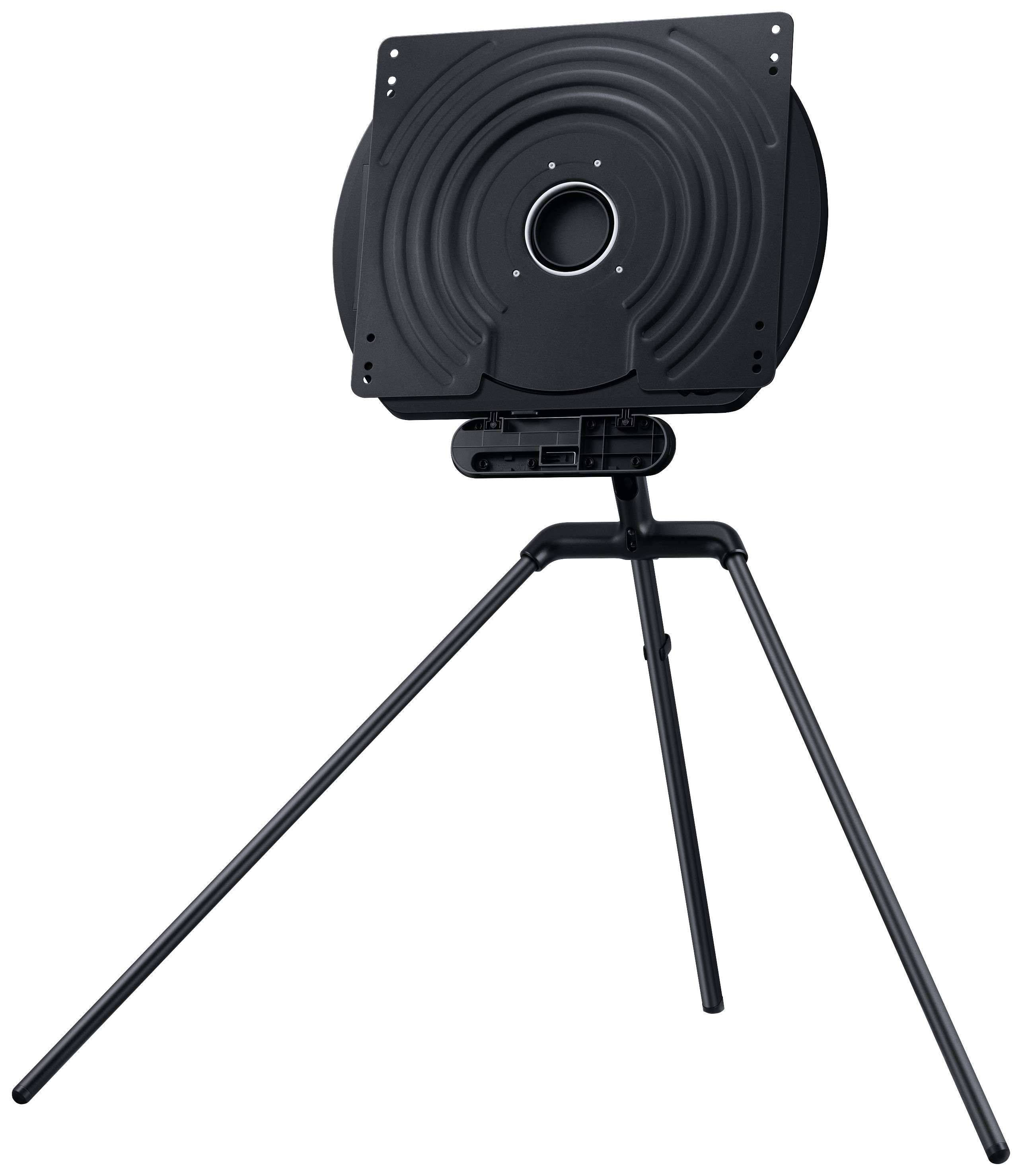 Stativ mit montierter, runder Platte in der Mitte, geeignet für Foto- oder Videoaufnahmen. Schwarzes Design, aus Metall gefertigt.