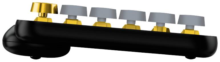 Eine Reihe von goldenen und grauen Knöpfen auf einem schwarzen Untergrund, möglicherweise Teil eines Musikinstruments.