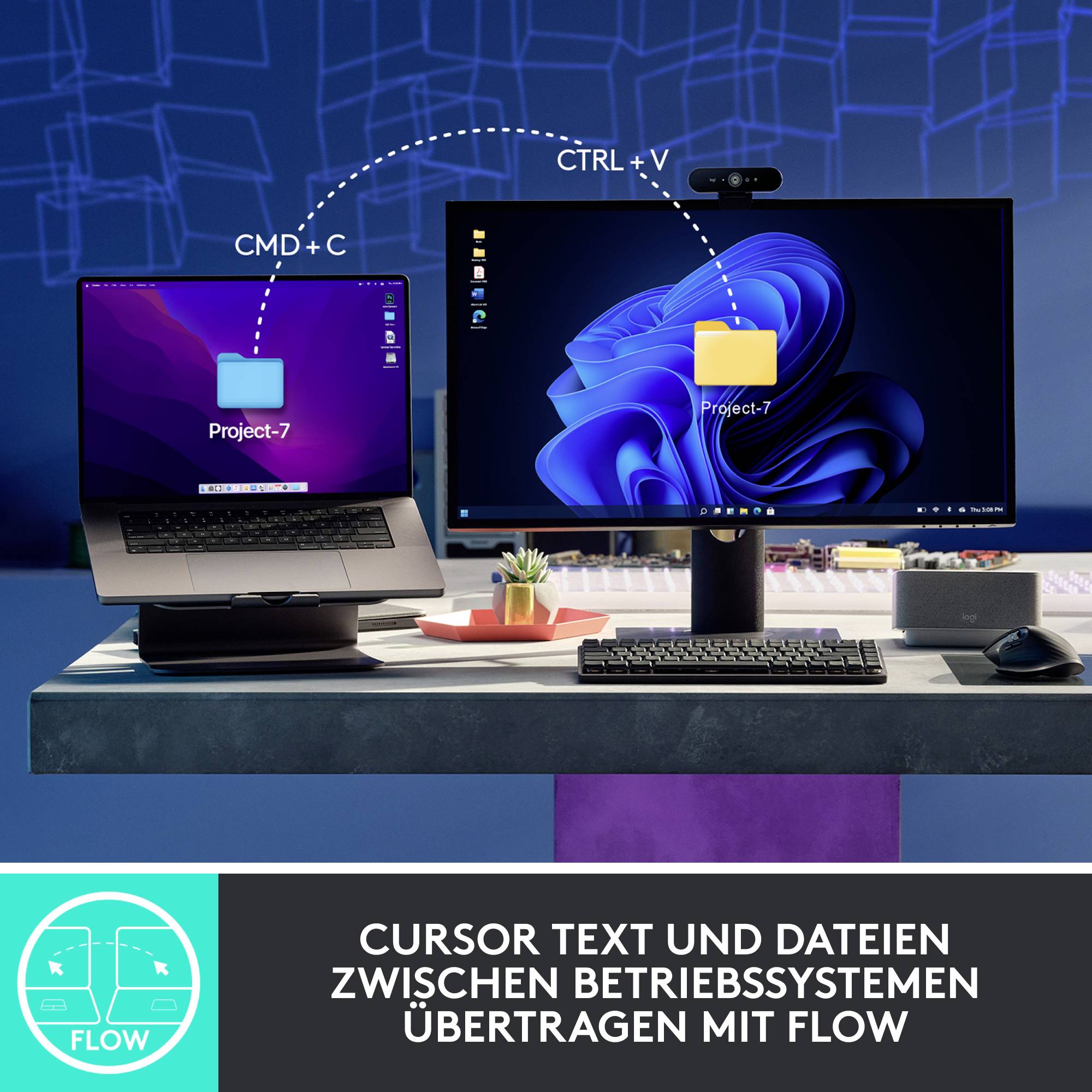 Ein Laptop und ein Desktop-PC auf einem Schreibtisch. Dateien werden zwischen den Geräten mit einer Tastenkombination übertragen.