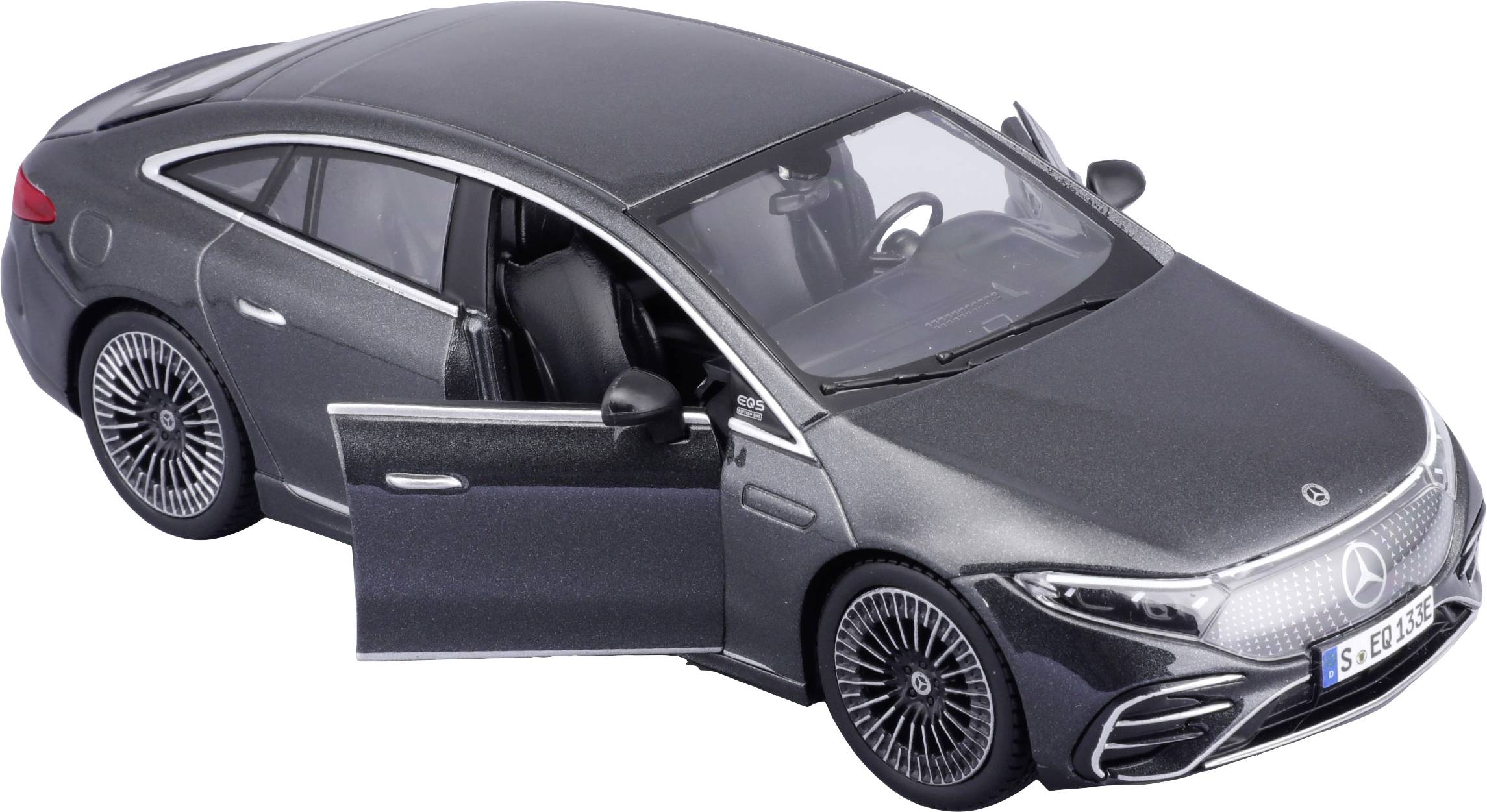 Ein graues Modellauto mit geöffneten Türen. Es handelt sich um eine stilisierte Limousine mit Schrägheck und modernen Felgen.