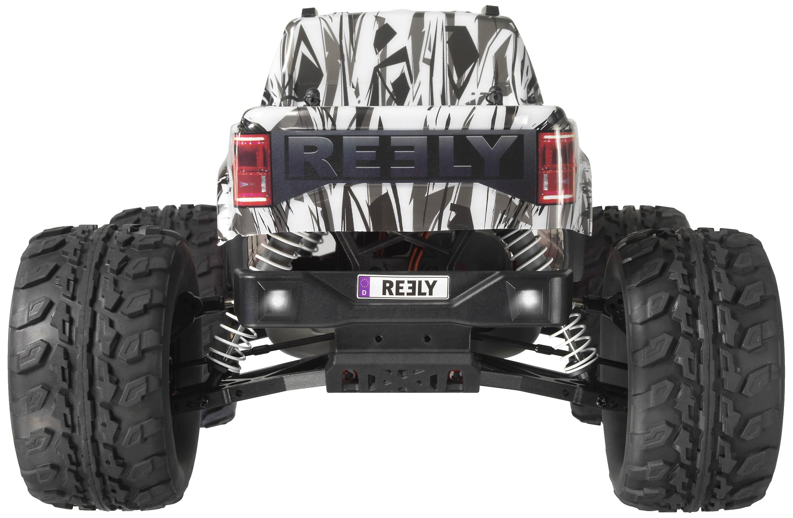 Ferngesteuertes Auto mit großen, robusten Reifen und schwarz-weißem Muster, aufgenommen von hinten, bereit für Offroad-Abenteuer.