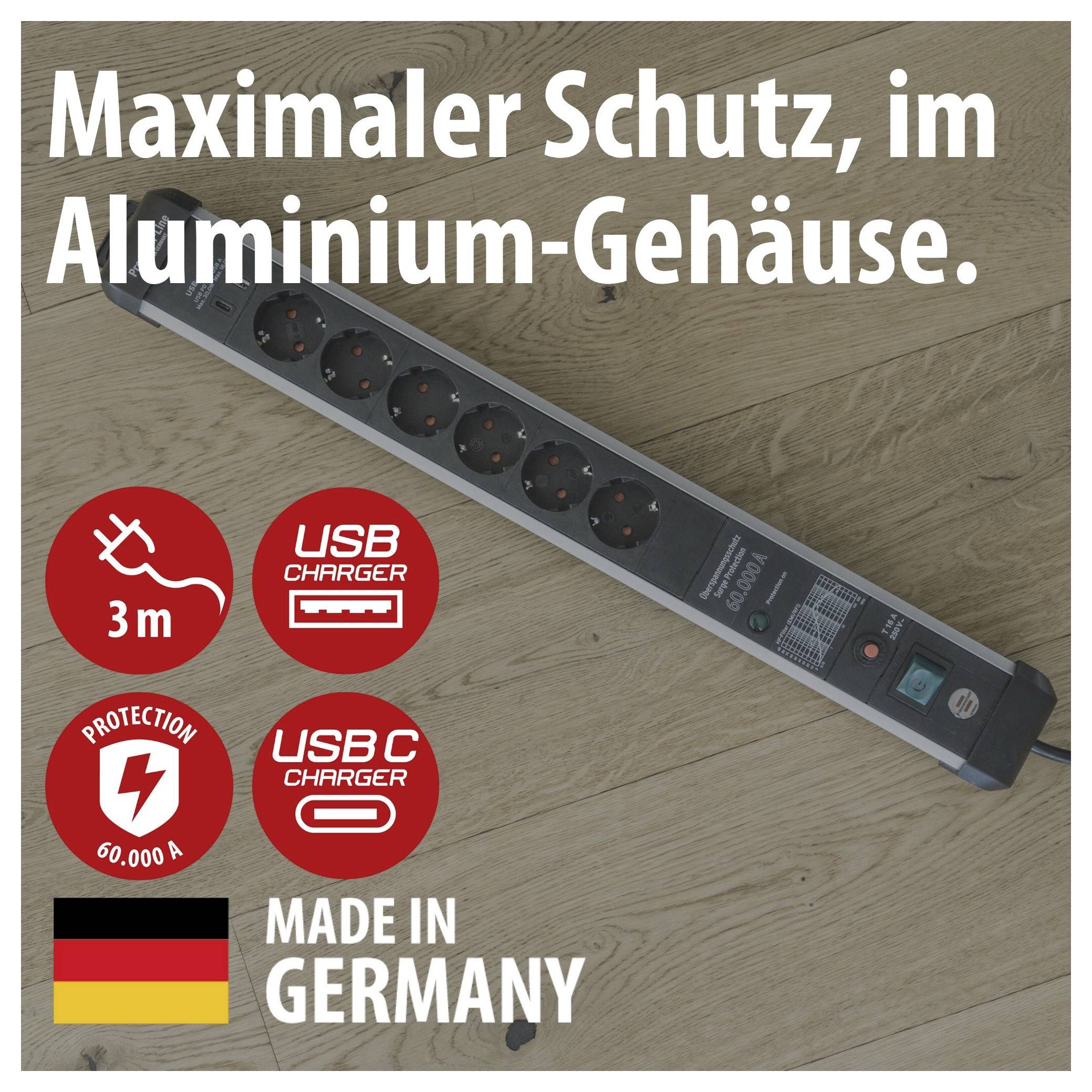 Steckdosenleiste im Aluminiumgehäuse auf Holzboden mit Text 'Maximaler Schutz, im Aluminium-Gehäuse.' sowie Symbolen für 3 m Kabel, USB Charger, 60.000 A und 'Made in Germany'.