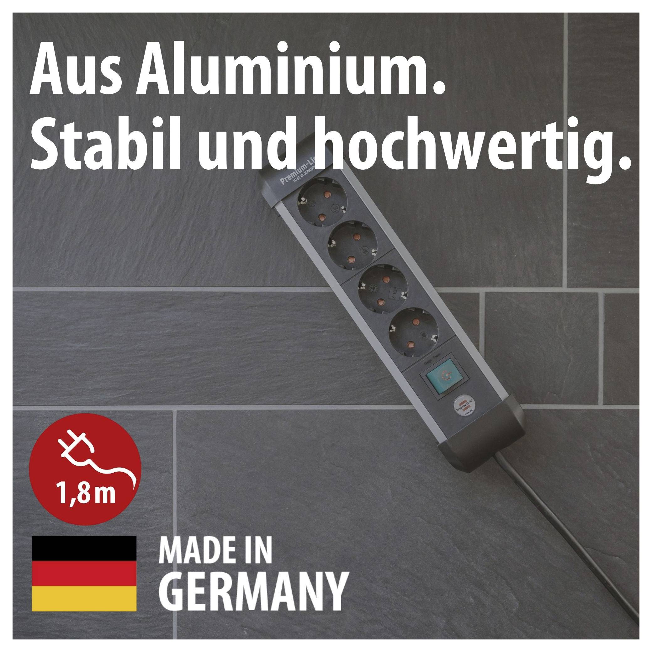 Aluminium-Steckdosenleiste mit vier Steckplätzen auf grauen Fliesen; Werbetext: 'Aus Aluminium. Stabil und hochwertig.' sowie 'Made in Germany' und 1,8 m.