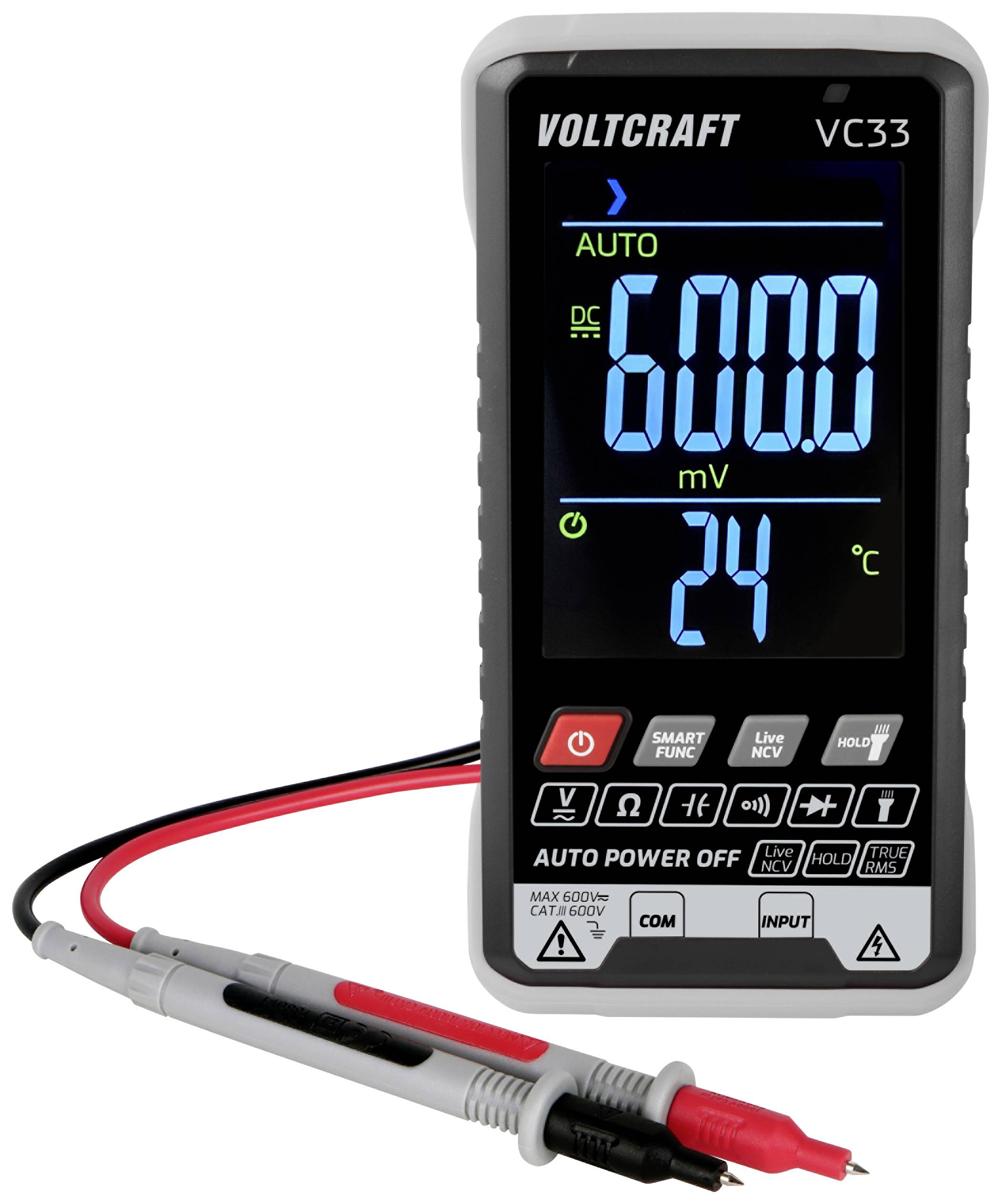 Das Bild zeigt ein digitales Multimeter Voltcraft VC33. Es misst 600 mV und zeigt 24 Grad Celsius an. Zwei Messleitungen sind angeschlossen.