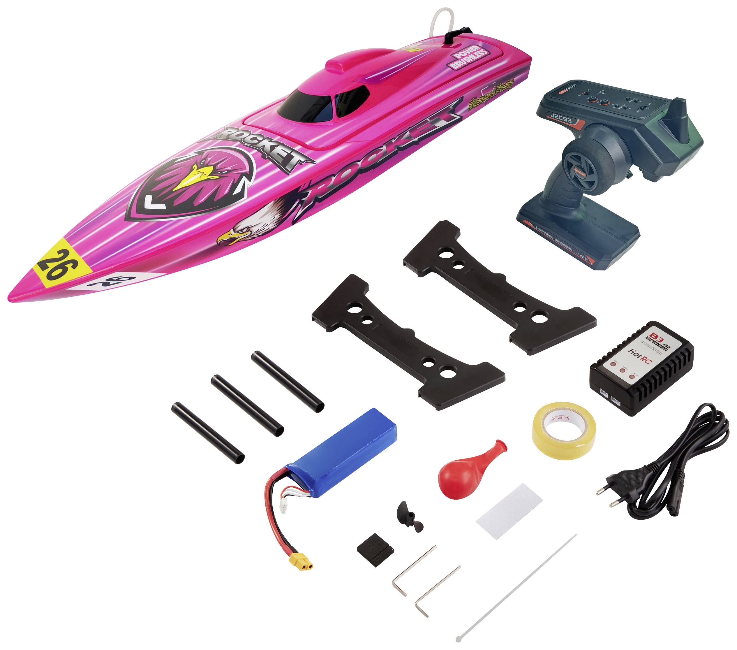 Ferngesteuertes Modellboot-Set mit pinkem Boot, Fernbedienung, zwei Ständer, Akku, Ladegerät, Luftballon und Zubehörteilen.