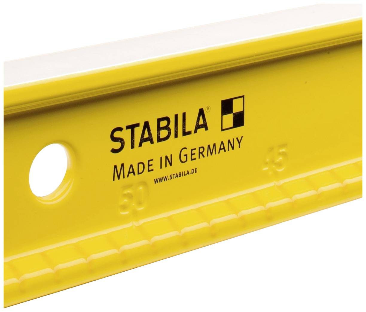 Ein Teil einer gelben Wasserwaage von Stabila mit Aufschrift 'Made in Germany'.
