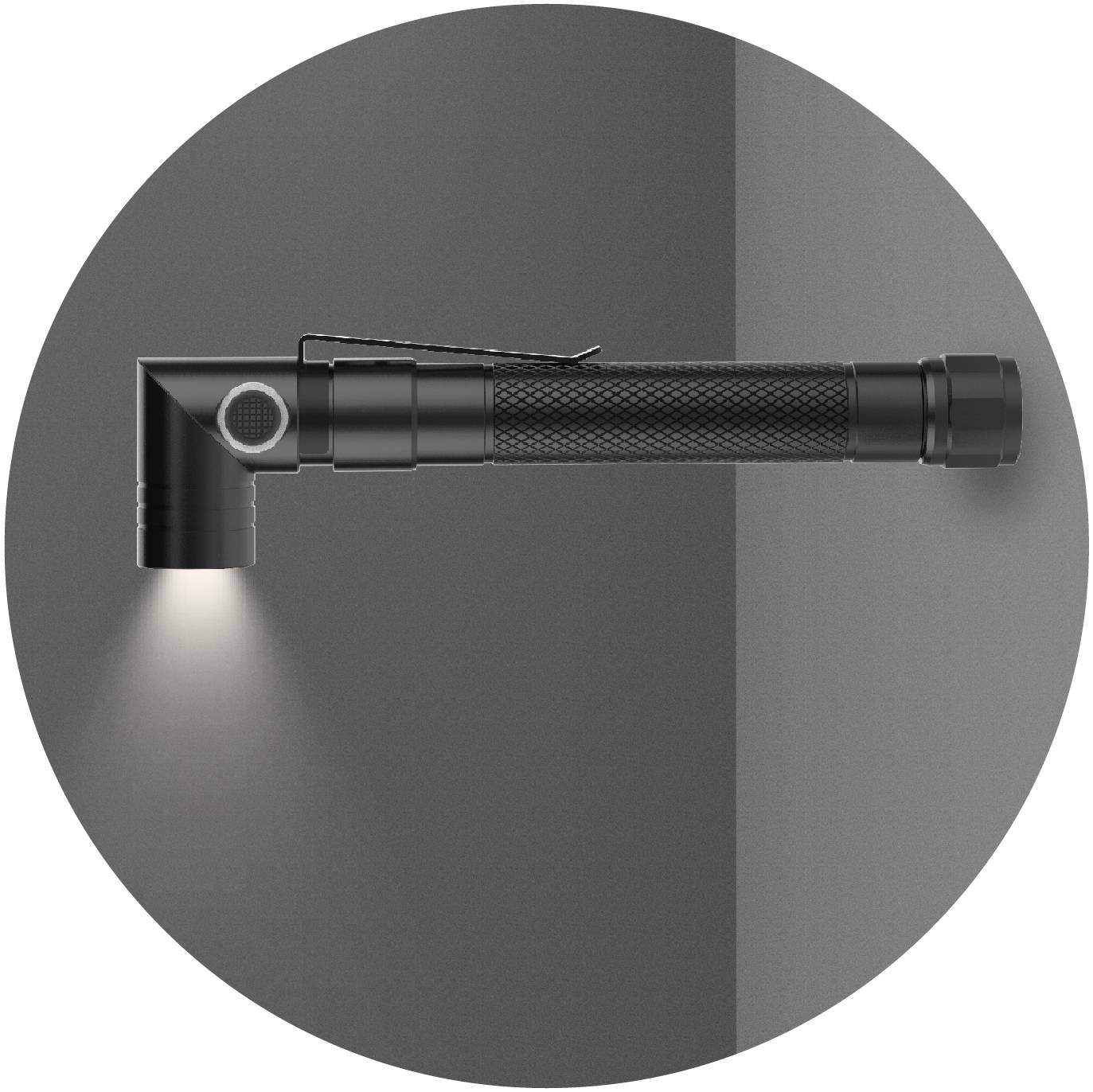 Taschenlampe in L-Form, strahlt Licht nach unten. Schwarzes Gehäuse mit geriffeltem Griff auf grauem Hintergrund.