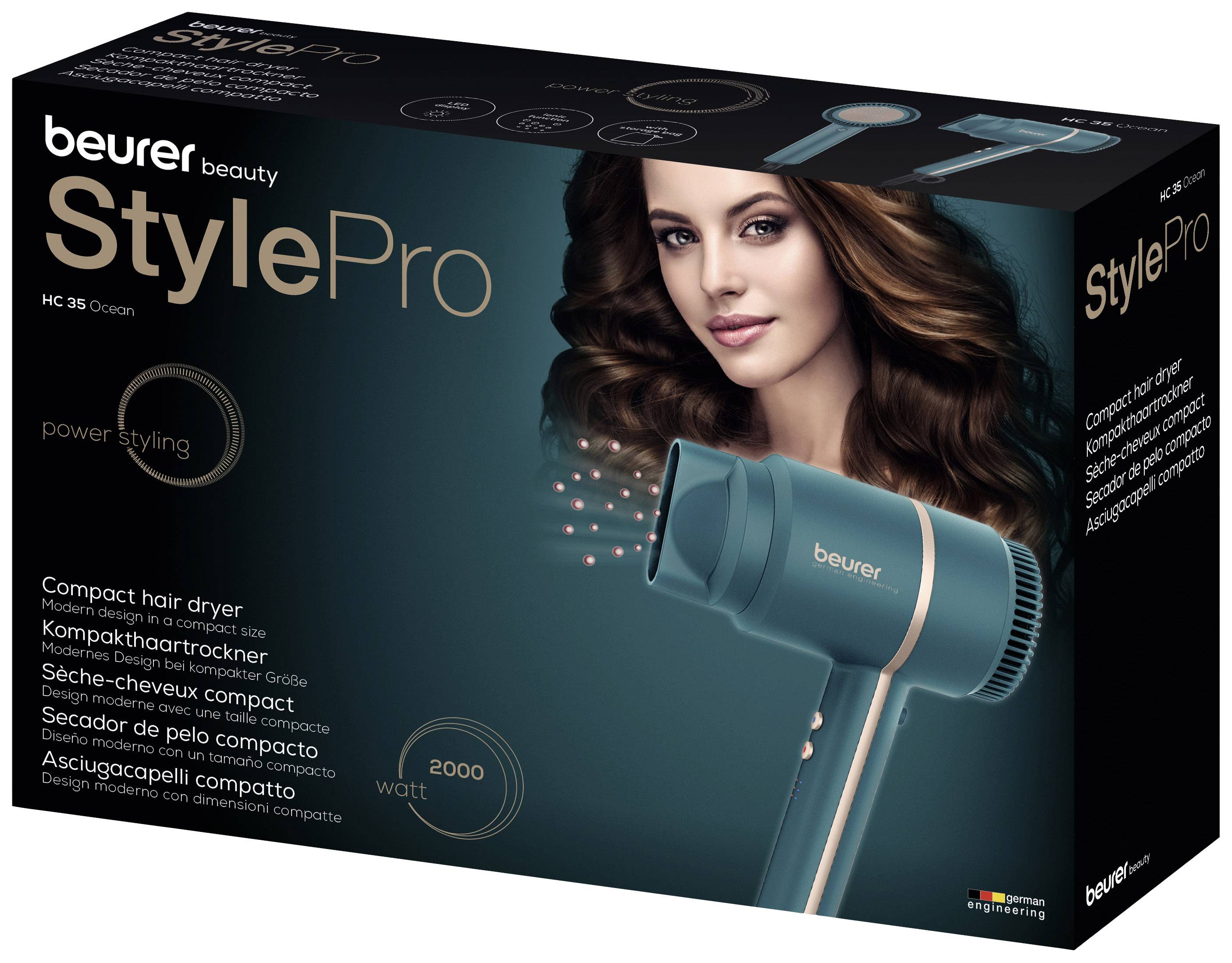 Verpackung eines Haarföns 'Beurer StylePro', Modell HC 35 Ocean. Abgebildet ist der Fön und eine Frau mit gut gestyltem Haar.