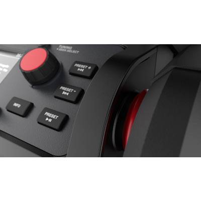 Nahaufnahme eines elektronischen Bedienfelds mit mehreren Knöpfen und Drehregler. Ein roter Knopf und weitere schwarze Tasten sind sichtbar.