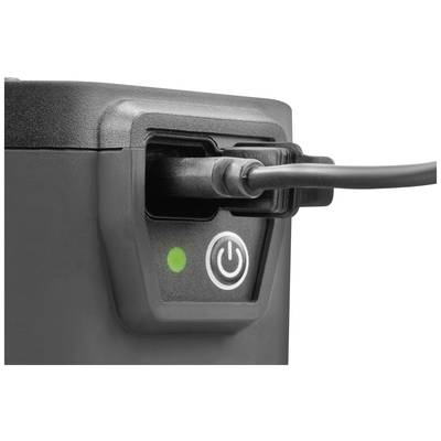 Schwarzer Netzschalter mit eingestecktem Kabel und leuchtender grüner Kontrollleuchte.