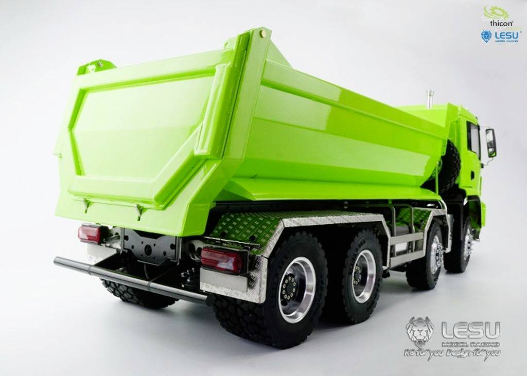 Grüner Kipplastwagen von hinten, mit robusten Reifen und markanten Rückleuchten. Logos der Marken 'Thicon' und 'LESU' sichtbar.