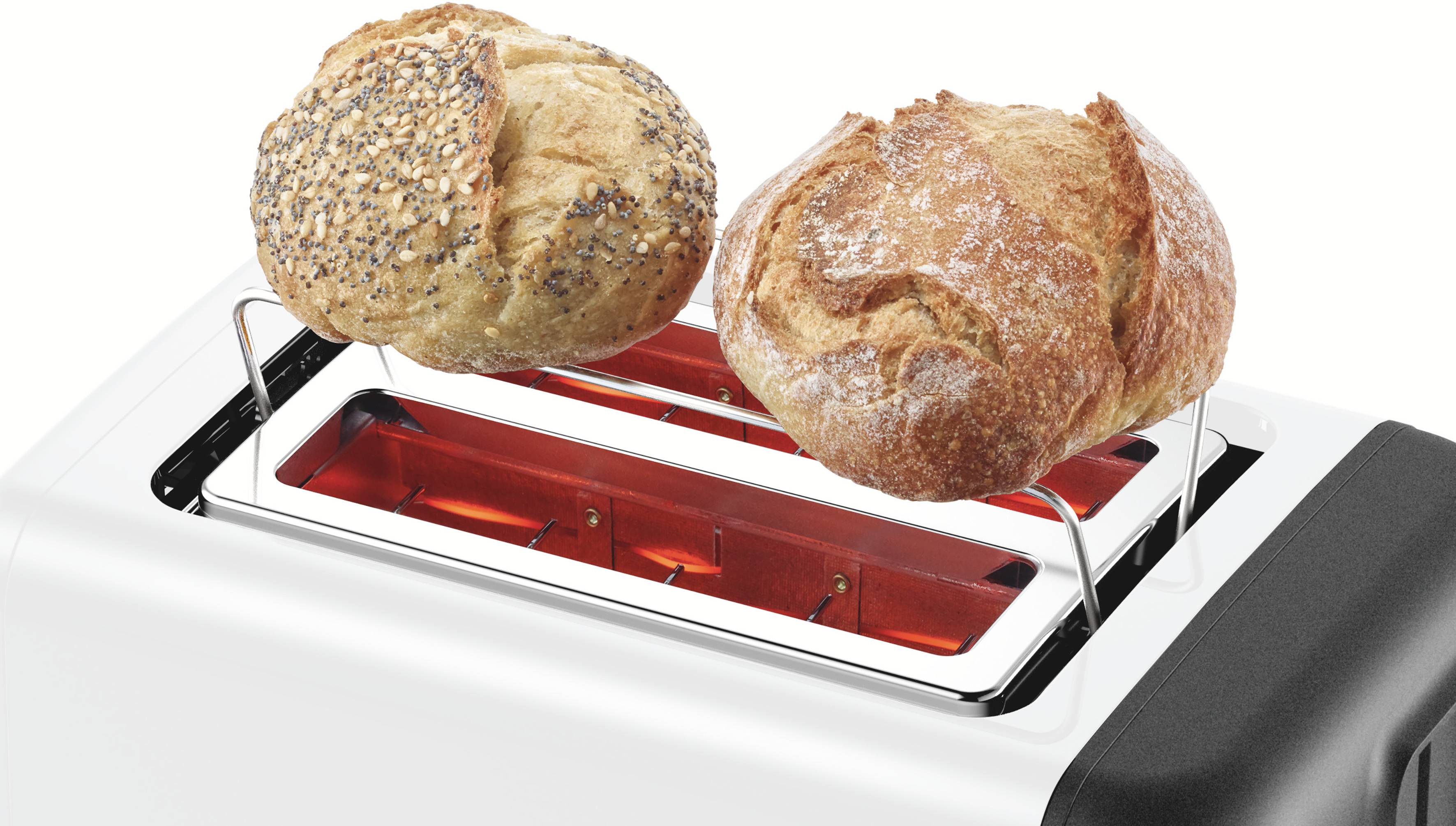 Zwei Brötchen werden in einem Toaster geröstet, eines mit Körnern und das andere klassisch. Der Toaster hat ein modernes Design.