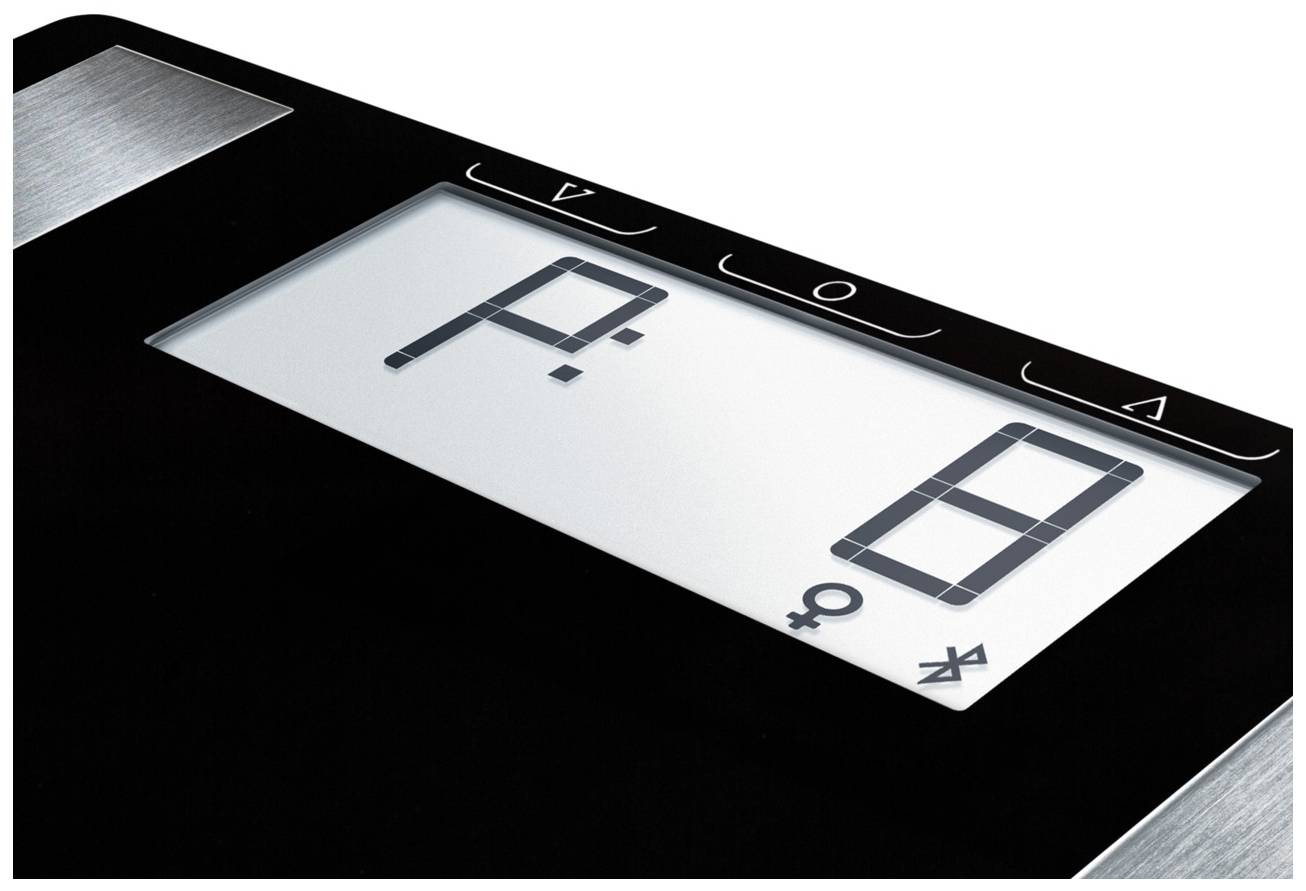 Eine digitale Waage mit einer Anzeige. Das Display zeigt das Symbol für Geschlecht und Körpergewicht.