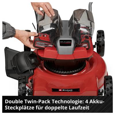 Rasenmäher mit offenem Akkufach; Hände setzen zwei Akkus ein. Hinweistext: 'Double Twin-Pack Technologie: 4 Akku-Steckplätze für doppelte Laufzeit'.