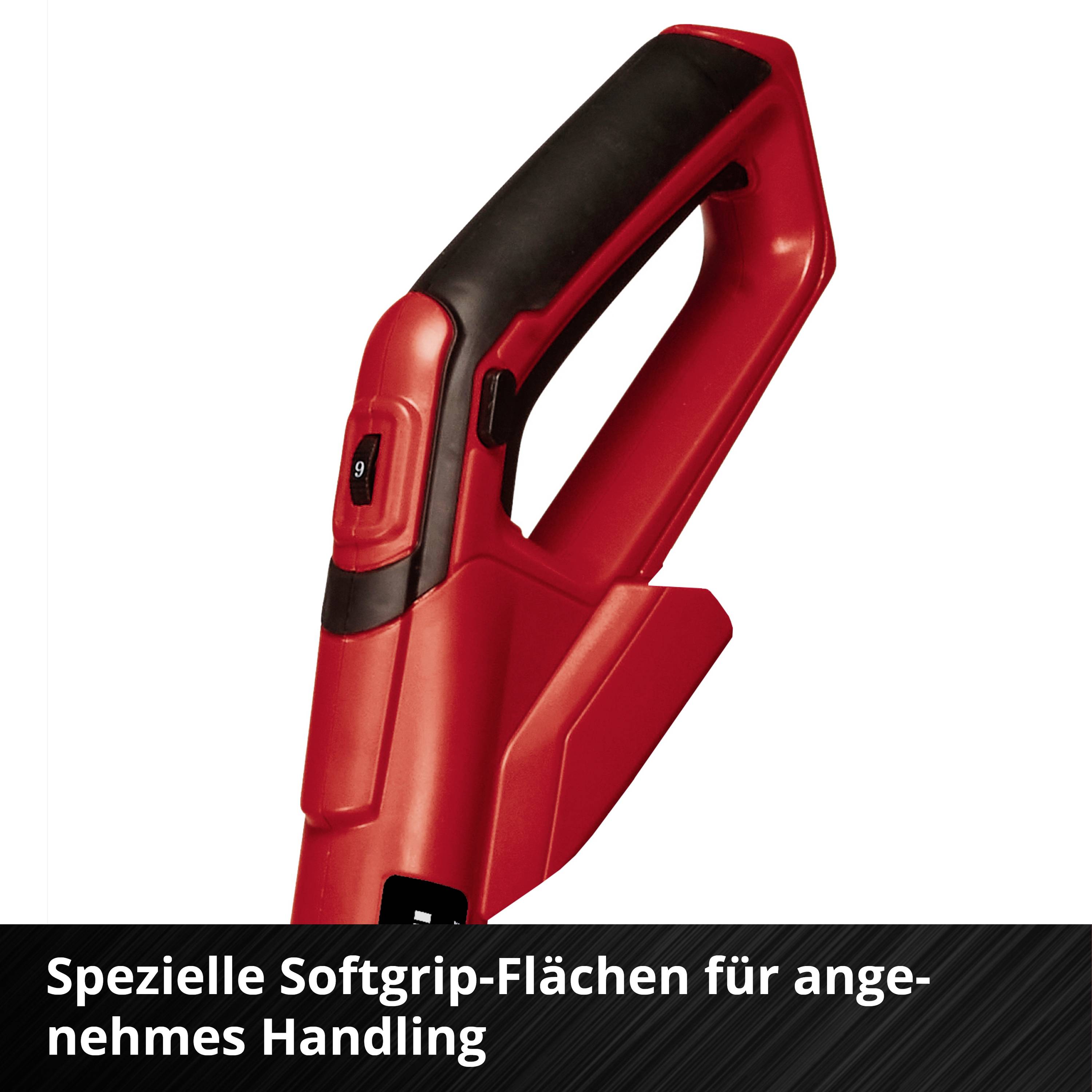 Roter Handgriff eines Geräts mit schwarzem Softgrip, Text: 'Spezielle Softgrip-Flächen für angenehmes Handling'.