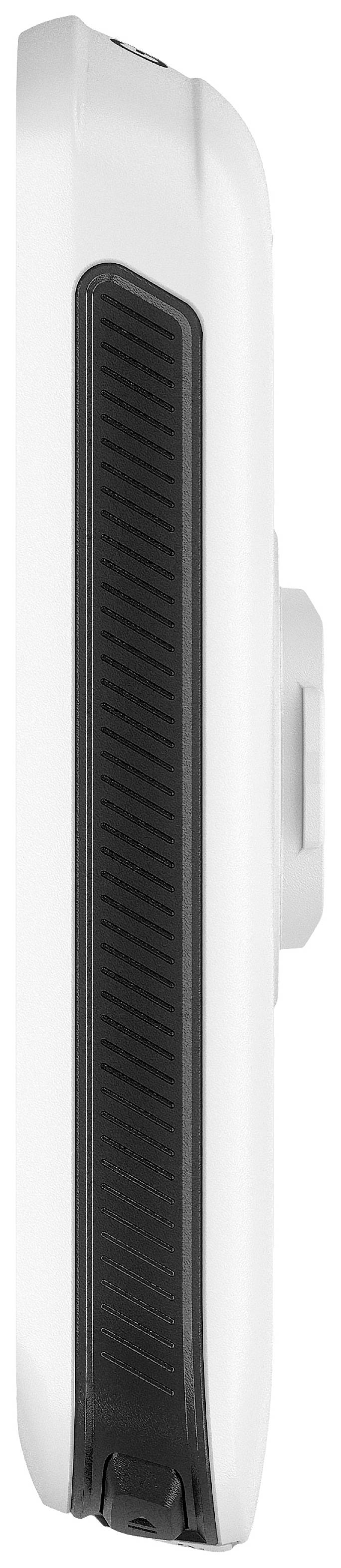 Die Seitenansicht eines weißen Geräts mit einem schwarzen Gummigriff, möglicherweise ein elektronisches Gerät oder ein Werkzeug.