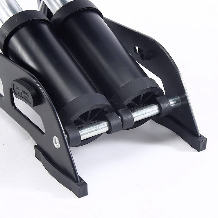 Ein schwarzer, metallischer Dosenhalter mit zwei Haltevorrichtungen, geeignet für die Befestigung von Zylindern oder Behältern.