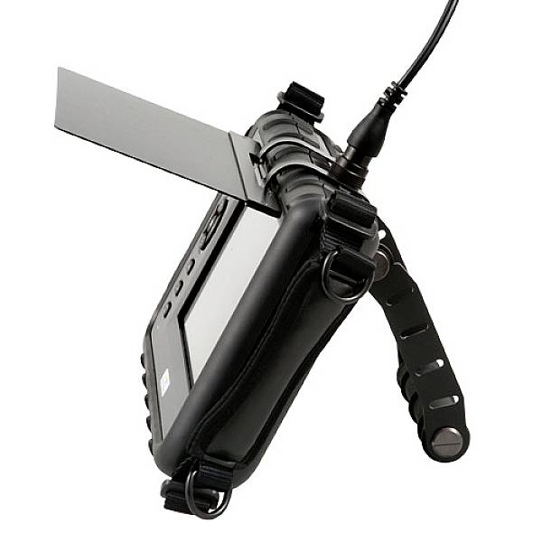 Ein robustes schwarzes Gerät mit Standfuß und angeschlossenem Kabel, eventuell ein tragbares elektronisches Messgerät.