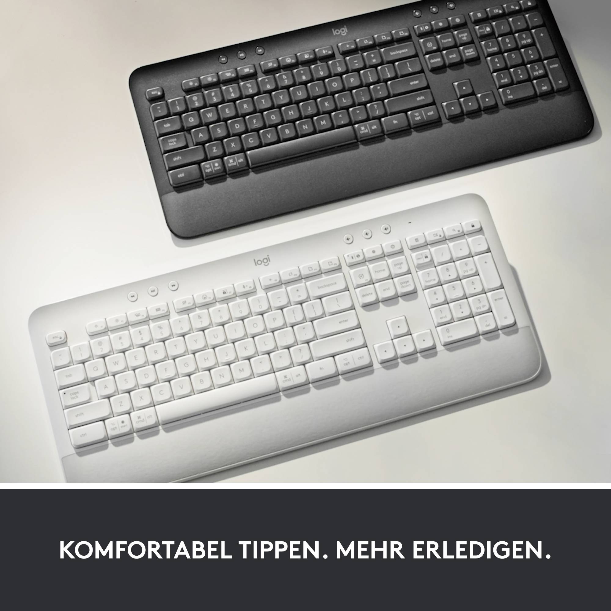 Zwei Logitech-Tastaturen, schwarz und weiß, auf grauem Hintergrund. Text unten: 'Komfortabel tippen. Mehr erledigen.'
