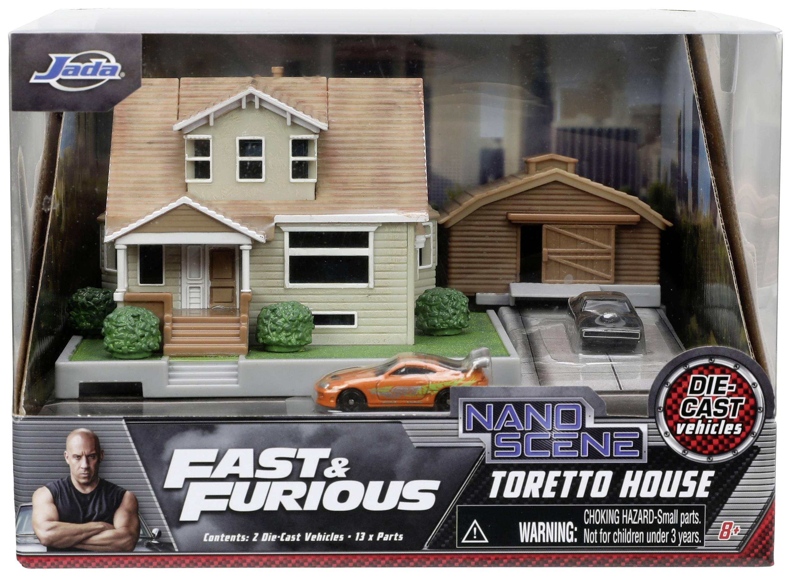 Spielzeug-Set in Karton mit Abbildung eines Hauses, einer Garage und einem orangen Auto. Markenname und 'Toretto House' auf der Verpackung.