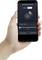Eine Hand hält ein Smartphone mit der App 'Smart Motion Sensor 360°'. Das Display zeigt Einstellungen für die Bewegungserkennung.