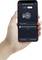 'Smart Motion Sensor 360°' App-Bildschirm auf Smartphone, zeigt Sensor-Status und 'Motion Distance' Einstellung mit Optionen 'Near', 'Medium', 'Far'.