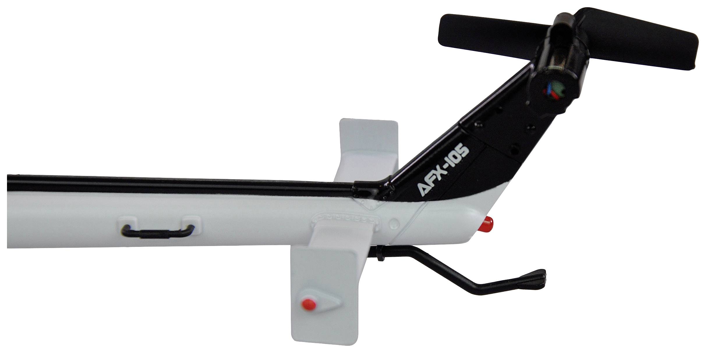 Heckrotor eines Modells mit der Aufschrift 'APX-105', schwarzer Rahmen, zwei kleine weiße Flügel und Hebel, farbiger Hinweis auf Sensor.