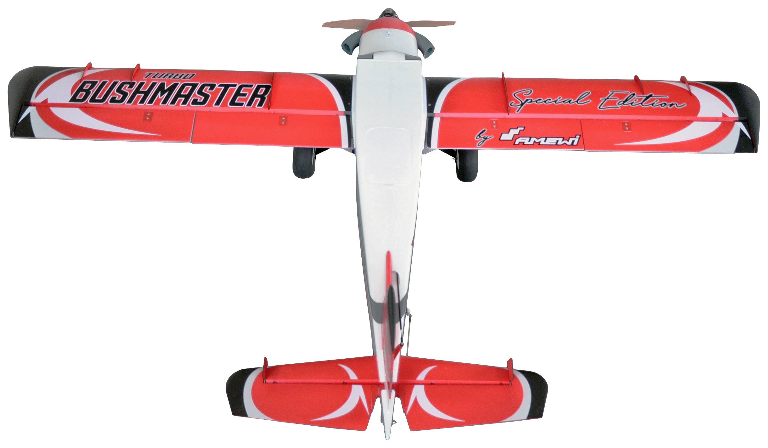 Fernsteuerbares Flugzeugmodell in Rot-Weiß mit dem Aufdruck 'Turbo Bushmaster'. Draufsicht mit sichtbarer Flügelausgestaltung.