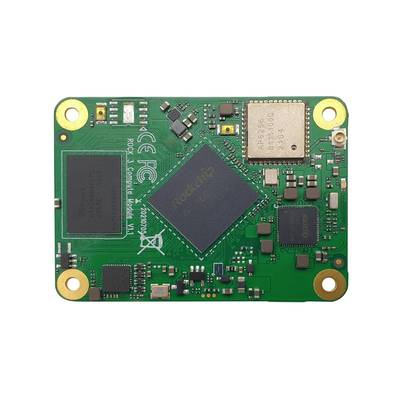 Ein kleines, grünes Einplatinencomputer-Modul mit verschiedenen elektronischen Bauteilen und Chips, darunter ein Chip mit der Aufschrift 'ROCK' in der Mitte.