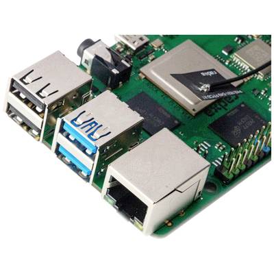 Grüne Hauptplatine mit mehreren USB-Ports, einem Ethernet-Anschluss und einem großen quadratischen silbernen Chip links oben.