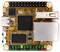 Ein Mini-Computer-Board mit mehreren Anschlüssen, darunter USB und Ethernet, auf einer goldfarbenen Platine.
