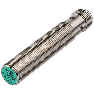 Zylindrischer induktiver Näherungssensor aus Metall mit geriffelter Oberfläche, kennzeichnet durch eine grüne Kappe mit Aufschrift.