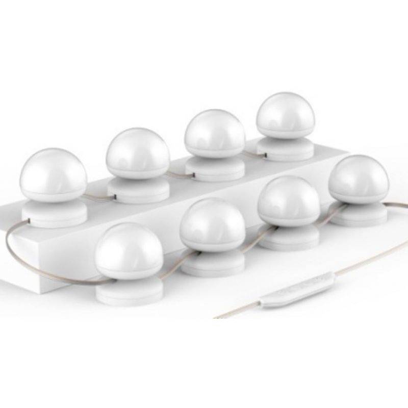 Acht abgerundete LED-Lichter auf einem rechteckigen Sockel, verbunden durch ein Kabel mit Schalter. Elegantes, modernes Design.