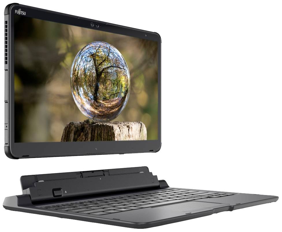 Ein Laptop mit abgedockter Tastatur zeigt auf dem Bildschirm ein Foto, auf dem ein Baum in einer Glaskugel spiegelt.