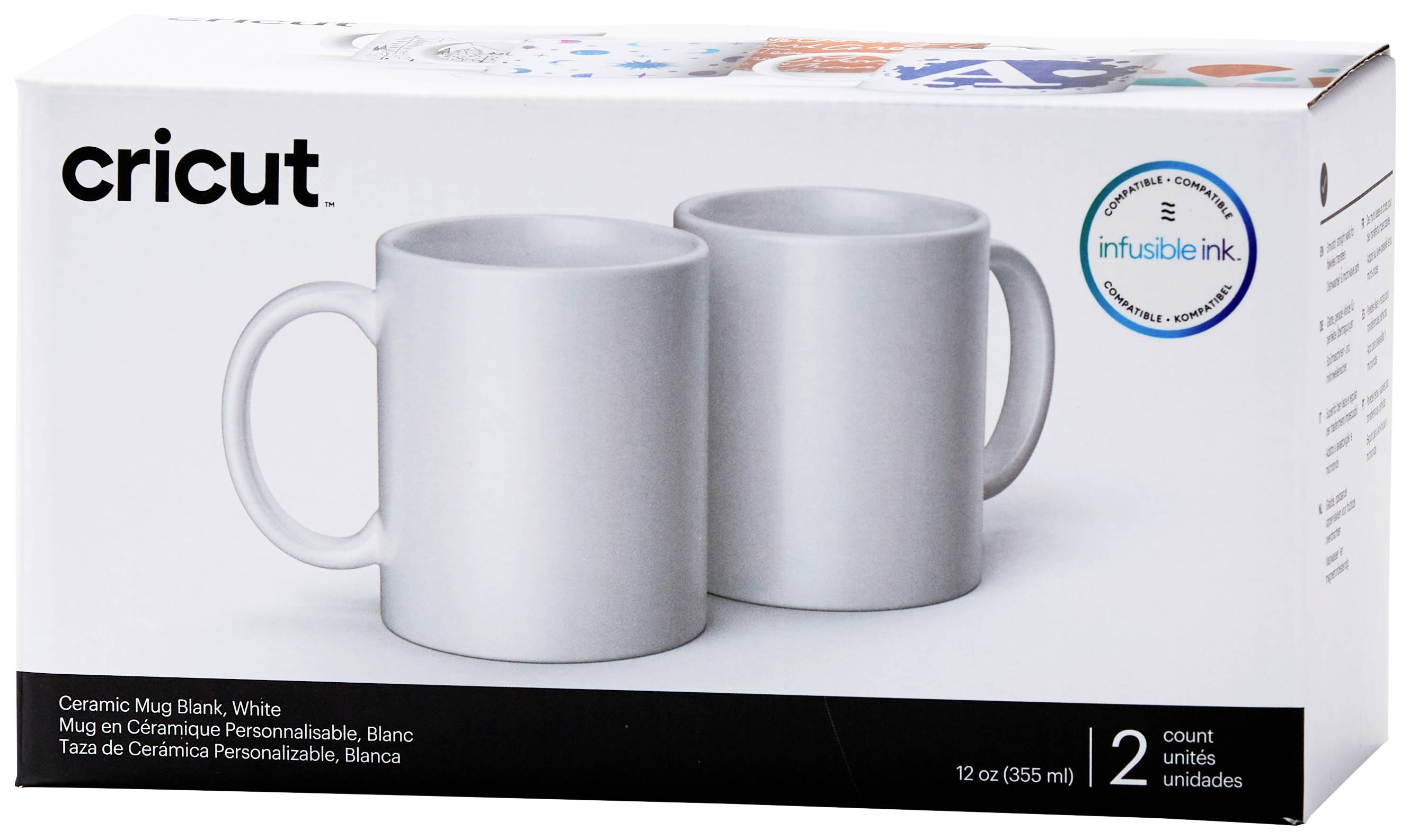 Zwei keramische Tassen in Weiß, 12 oz (355 ml), auf einer Produktverpackung. Marke 'Cricut', geeignet für Infusible Ink Projekte.