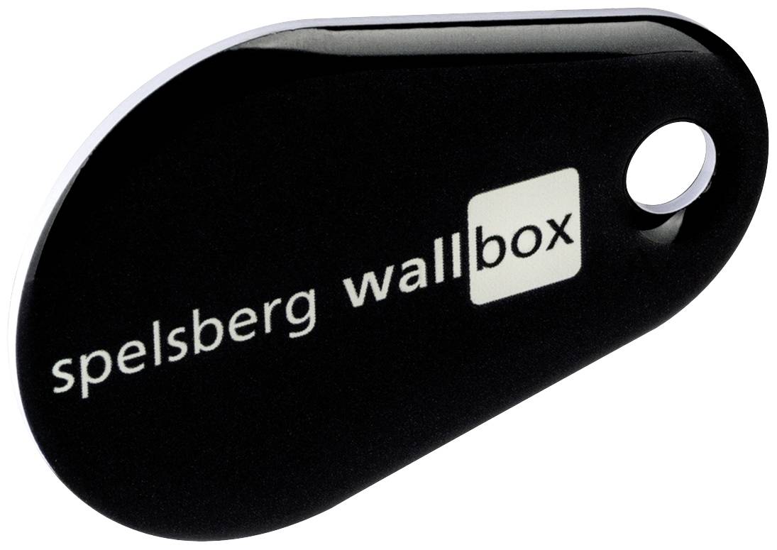Schlüsselanhänger in Form eines schwarzen Ovals mit der Aufschrift 'spelsberg wallbox' in Weiß, neben einem Loch am rechten Rand.